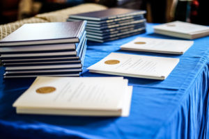 Hard bound books and event programs