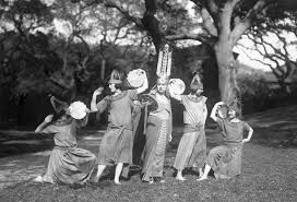 Women performing in costume 1923