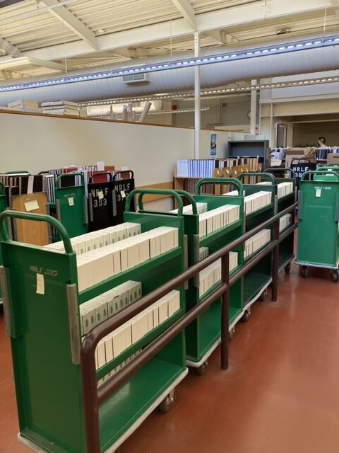 Row of green book carts