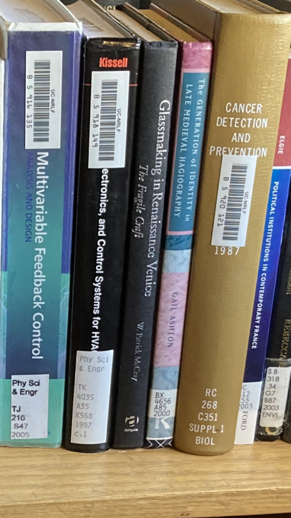 Selection of books on a cart