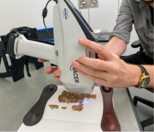 Dr Jesse Obert performing the initial scan with the portable XRF
