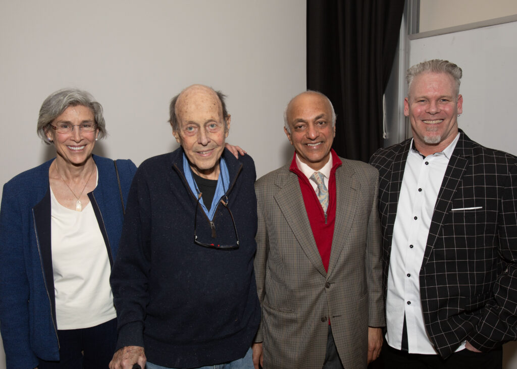 James C. Scott and Todd Holmes with K.Sivaramankrishnan and Elizabeth Wood together at a celebration event.