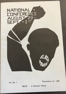 Black & white program for the National Black Power conference, with an image of an African American person who is raising their fist in the air